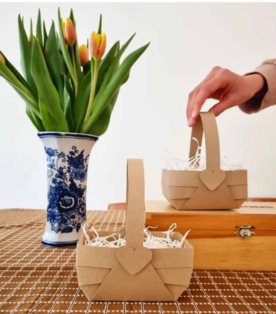 DIY paper basket made in Kraft paper, tulip flower background