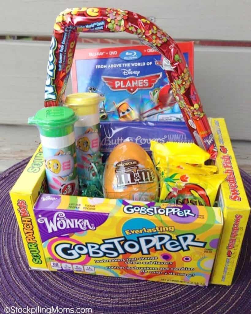 Basket made out of candies itself such as m&m, gobstopper, nerds, Reese’s and a coloring page