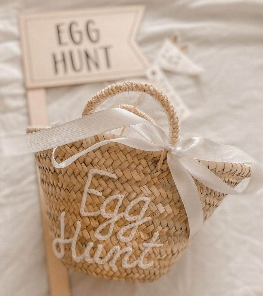 Egg hunt basket made of woven material. It’s looks natural and pretty minimalistic 