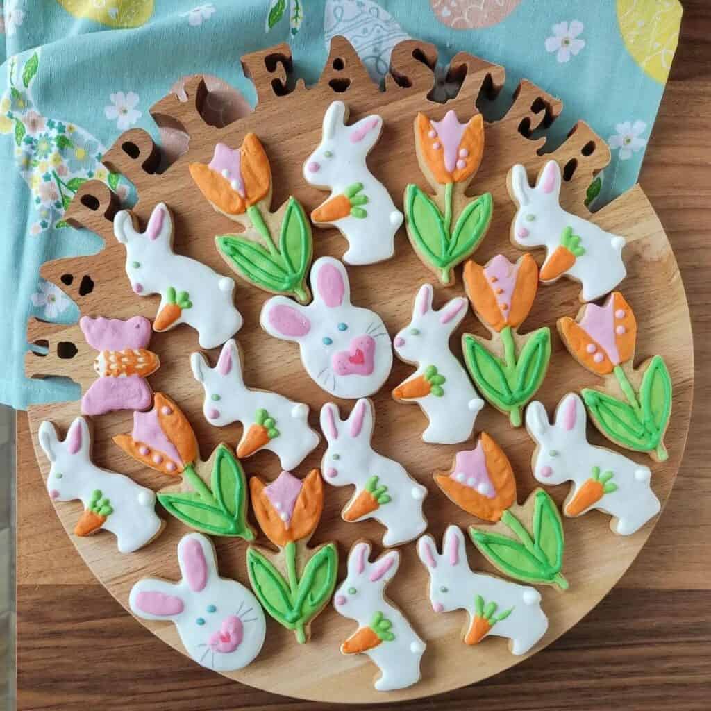 Tray of Easter cookies decorated in tulip flower, bunny with a carrot sugar cookies 